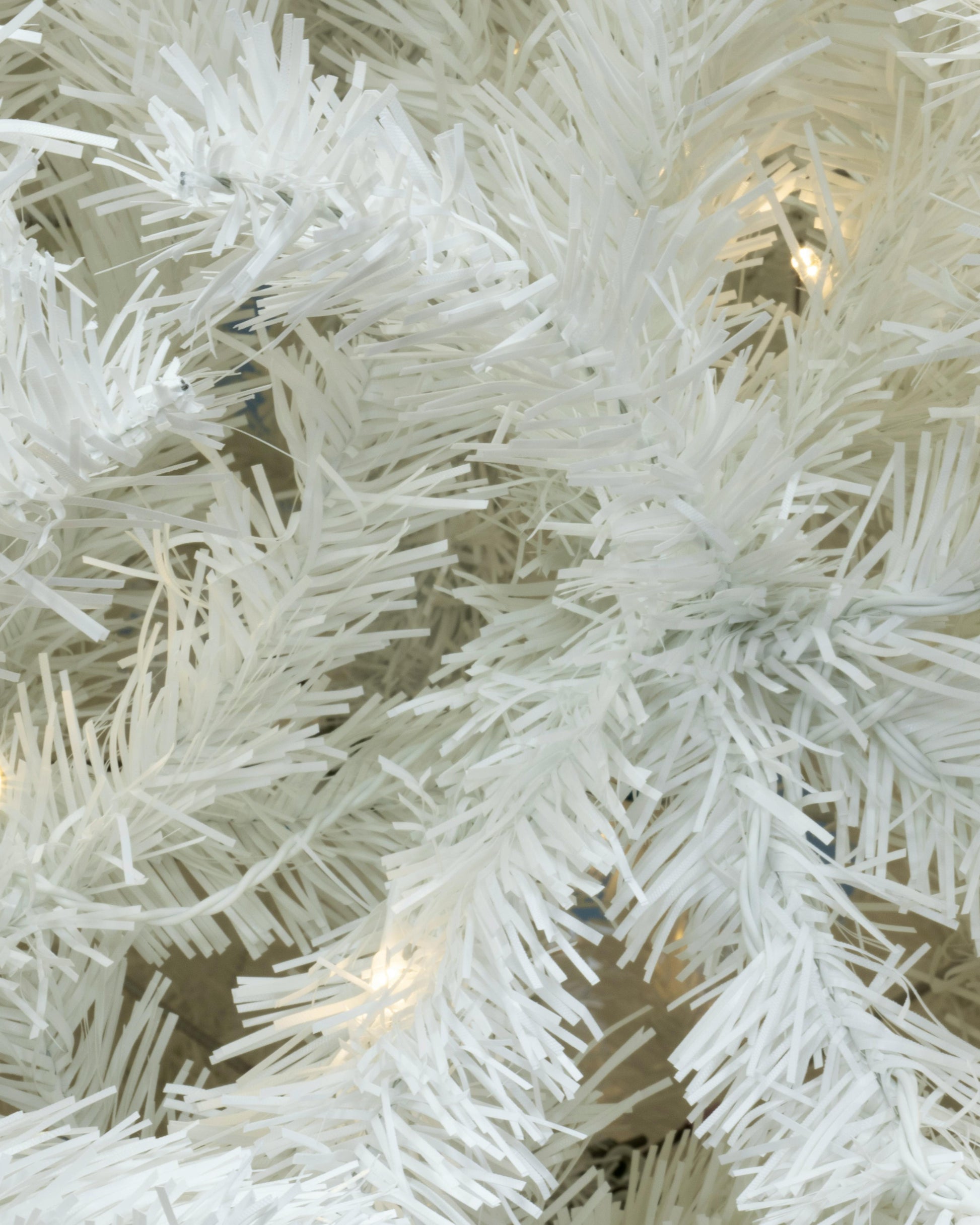 The 10ft Pre-lit Bianca Pine Tree with Warm White Lights